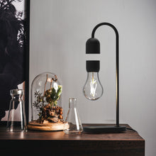 Load image into Gallery viewer, Luksuriøs bordlampe, der kombinerer moderne design med innovative svæve funktion.